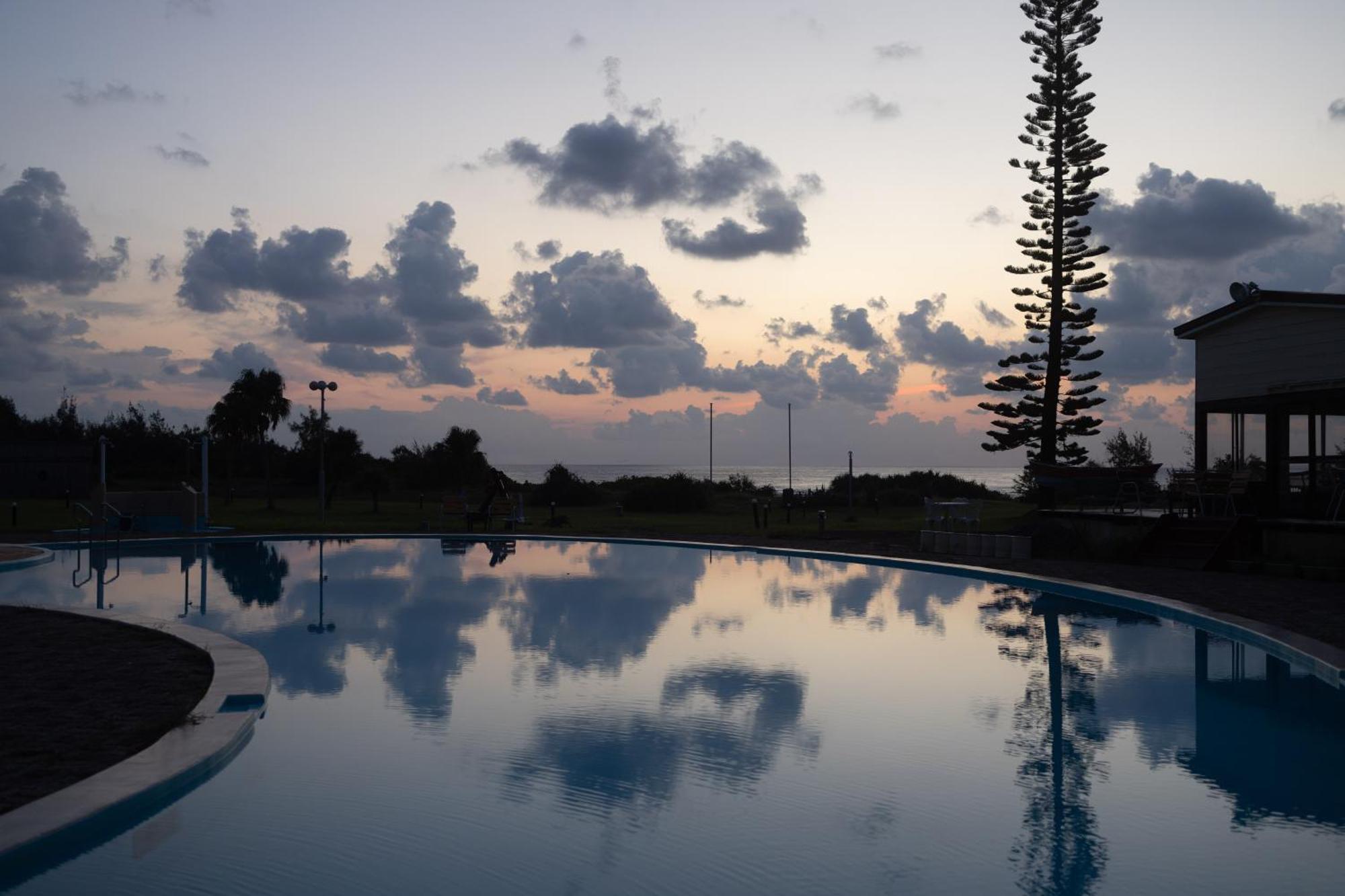Отель Coral Palms Suno Экстерьер фото